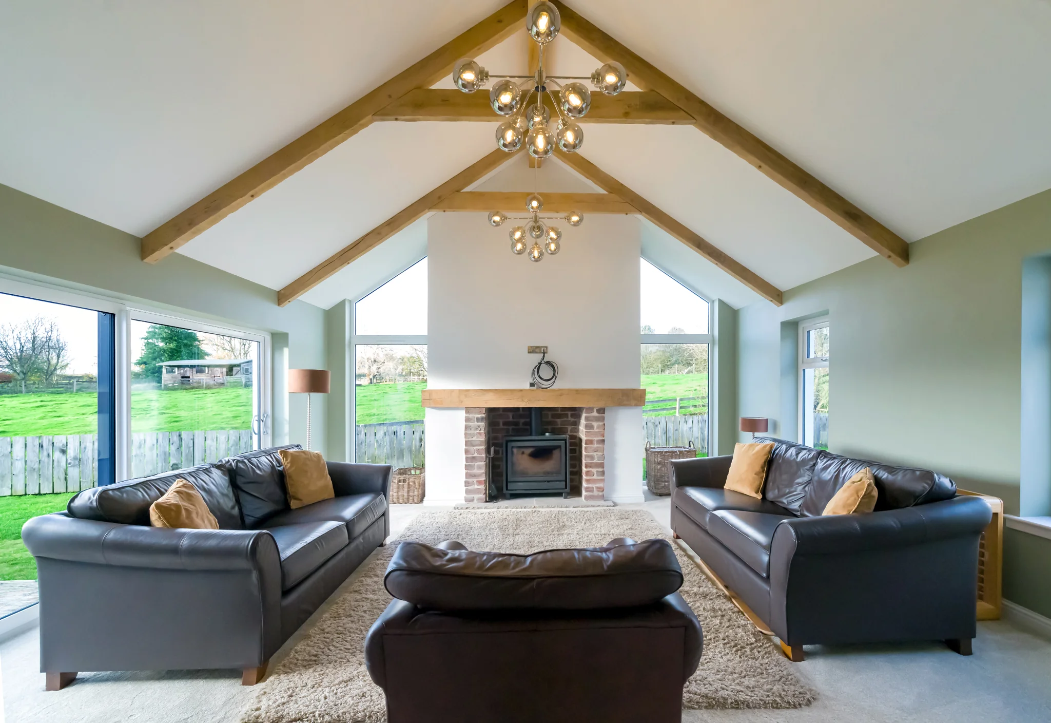 House Extensions in Ayr: Why Winter Is the Time to Plan Yours 1 Living room extension with vaulted ceiling and solid oak beams at Burton Cottage, Ayrshire